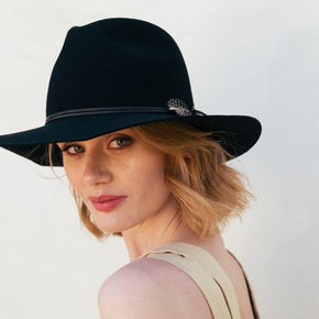 Premium Photo  A woman wearing a hat